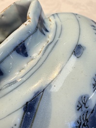 A blue and white Dutch Delft covered vase and two polychrome plates, 17/18th C.