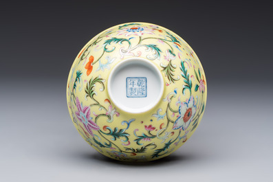 A Chinese famille rose sgraffito lemon-yellow-ground 'Flower Scrolls' bowl, Qianlong mark, 20th C.