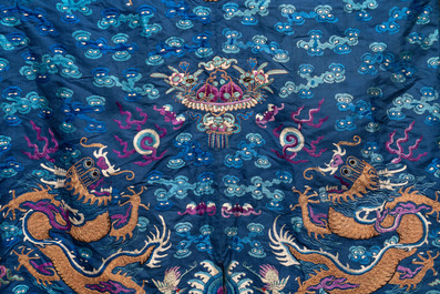 A Chinese blue-ground embroidered silk 'Dragon' robe, 'Ji Fu' 吉服, 19th C.