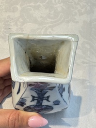 A pair of Chinese blue and white 'Antiquities' wall pocket vases, Kangxi