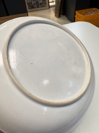 A fine Chinese famille rose eggshell plate with a lady and playing boys, Yongzheng