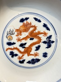 A Chinese blue and white iron-red-decorated 'Dragon' plate, Jing Jin Tang 精進堂 mark, 19th C.