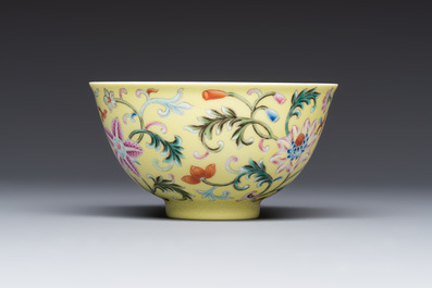 A Chinese famille rose sgraffito lemon-yellow-ground 'Flower Scrolls' bowl, Qianlong mark, 20th C.