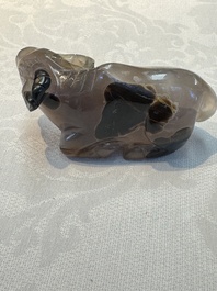 A group of ten Chinese hardstone and cherry amber carvings, 20th C.