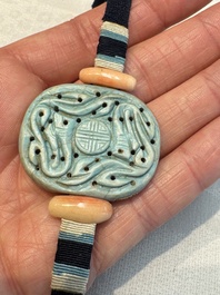 A group of ten Chinese hardstone and cherry amber carvings, 20th C.