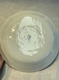 A blue and white Dutch Delft covered vase and two polychrome plates, 17/18th C.