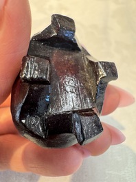 A group of ten Chinese hardstone and cherry amber carvings, 20th C.