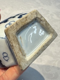 A pair of Chinese blue and white 'Antiquities' wall pocket vases, Kangxi