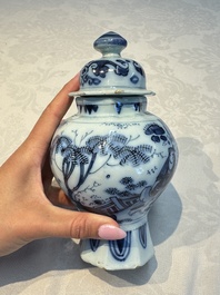 A blue and white Dutch Delft covered vase and two polychrome plates, 17/18th C.