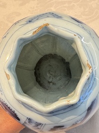 A blue and white Dutch Delft covered vase and two polychrome plates, 17/18th C.