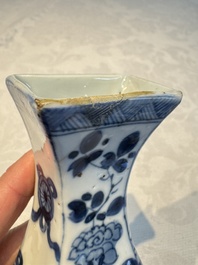 A pair of Chinese blue and white 'Antiquities' wall pocket vases, Kangxi
