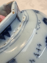 A blue and white Dutch Delft covered vase and two polychrome plates, 17/18th C.