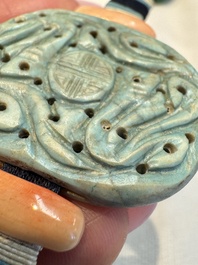 A group of ten Chinese hardstone and cherry amber carvings, 20th C.