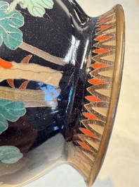 A pair of Japanese silver-wired cloisonn&eacute; enamel vases with birds among flowering branches, Meiji period, 19th C.