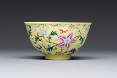 A Chinese famille rose sgraffito lemon-yellow-ground 'Flower Scrolls' bowl, Qianlong mark, 20th C.