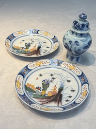 A blue and white Dutch Delft covered vase and two polychrome plates, 17/18th C.