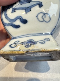 A pair of Chinese blue and white 'Antiquities' wall pocket vases, Kangxi