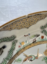 A Chinese famille rose 'Doctor's Visit' plate after Cornelis Pronk, Qianlong
