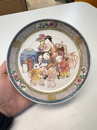 A fine Chinese famille rose eggshell plate with a lady and playing boys, Yongzheng