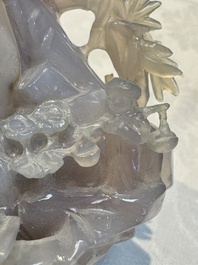 A group of ten Chinese hardstone and cherry amber carvings, 20th C.