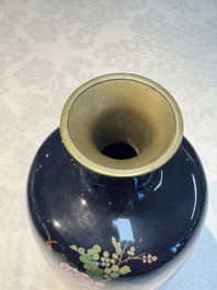 A pair of Japanese silver-wired cloisonn&eacute; enamel vases with birds among flowering branches, Meiji period, 19th C.