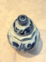 A blue and white Dutch Delft covered vase and two polychrome plates, 17/18th C.