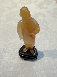 A group of ten Chinese hardstone and cherry amber carvings, 20th C.