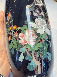 A pair of Japanese silver-wired cloisonn&eacute; enamel vases with birds among flowering branches, Meiji period, 19th C.