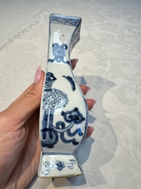 A pair of Chinese blue and white 'Antiquities' wall pocket vases, Kangxi