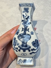 A pair of Chinese blue and white 'Antiquities' wall pocket vases, Kangxi