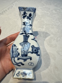 A pair of Chinese blue and white 'Antiquities' wall pocket vases, Kangxi