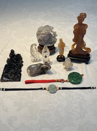 A group of ten Chinese hardstone and cherry amber carvings, 20th C.