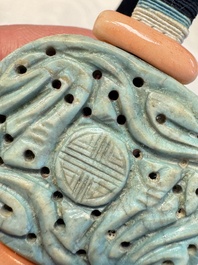 A group of ten Chinese hardstone and cherry amber carvings, 20th C.