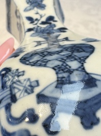 A pair of Chinese blue and white 'Antiquities' wall pocket vases, Kangxi