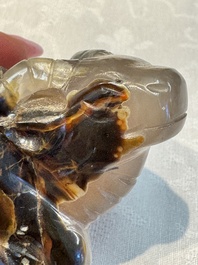 A group of ten Chinese hardstone and cherry amber carvings, 20th C.