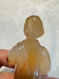 A group of ten Chinese hardstone and cherry amber carvings, 20th C.