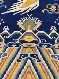 A Sino-Tibetan woollen 'Dragon' pillar carpet, 19th C.