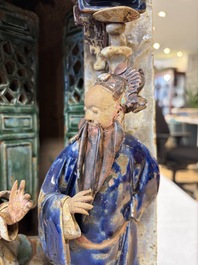 A large and fine Chinese polychrome-glazed Shiwan stoneware group of immortals, 19th C.