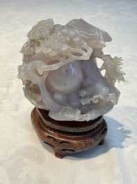 A group of ten Chinese hardstone and cherry amber carvings, 20th C.