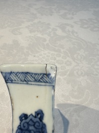 A pair of Chinese blue and white 'Antiquities' wall pocket vases, Kangxi