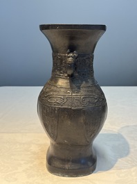 A Chinese archaistic bronze vase, 'Hu 壺', Ming