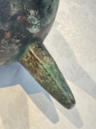 A Chinese archaic bronze ritual tripod food vessel, 'Li 鬲', early Shang