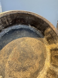 A Chinese archaistic bronze vase with Taotie handles, 'Hu 壺', Ming