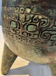 A Chinese archaic bronze ritual tripod food vessel, 'Li 鬲', early Shang