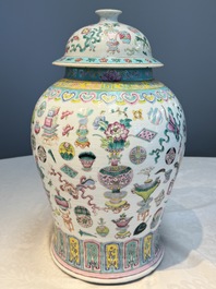 A pair of Chinese famille rose 'Antiquities' covered vases and a dish, 19th C.