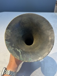 A Chinese archaistic bronze vase with Chilong design, 'Gu 觚', Ming
