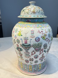 A pair of Chinese famille rose 'Antiquities' covered vases and a dish, 19th C.