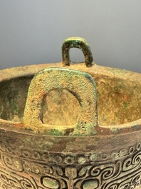 A Chinese archaic bronze ritual tripod food vessel, 'Li 鬲', early Shang