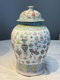 A pair of Chinese famille rose 'Antiquities' covered vases and a dish, 19th C.