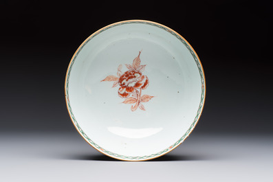 A Chinese famille verte relief-carved bowl with gilt iron-red floral design, Kangxi